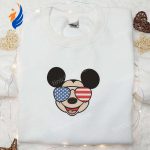Show off your patriotic pride with America Glasses x Mickey Embroidered Shirt – the best Disney patriotic shirt! Show off your patriotic pride with America Glasses x Mickey Embroidered Shirt – the best Disney patriotic shirt!