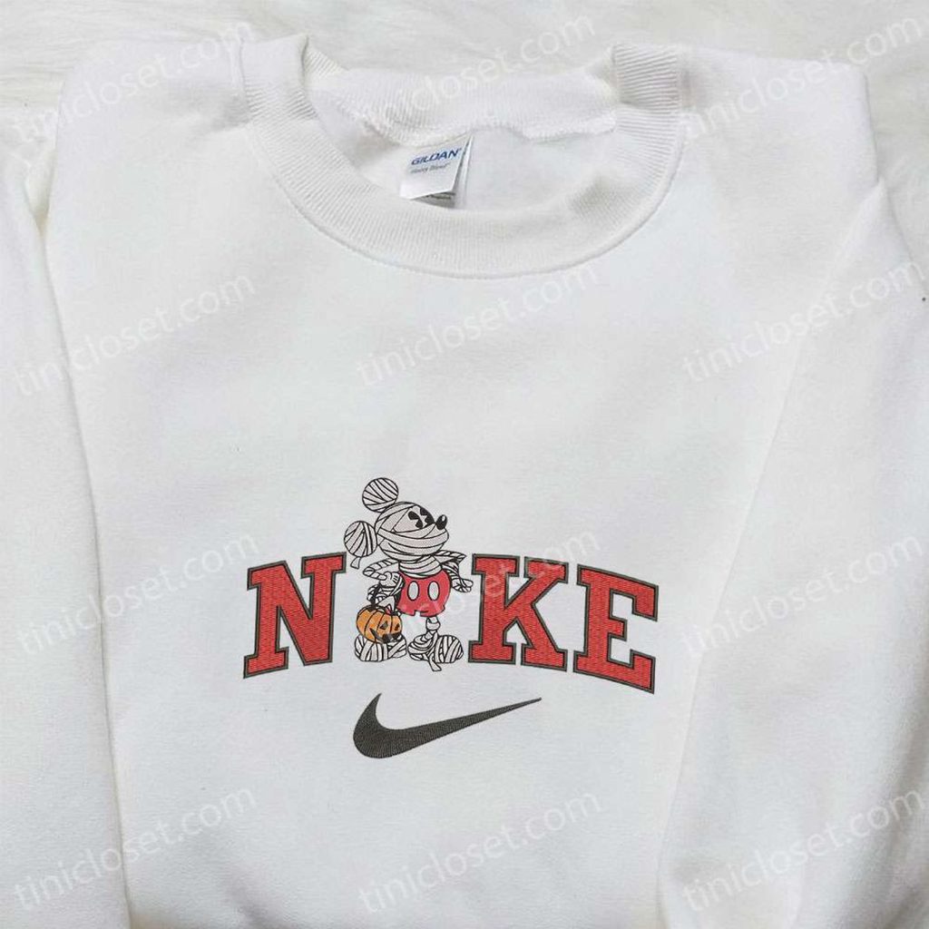 Mickey Mouse Mummy Halloween x Nike Embroidered Sweatshirt: Spooky Halloween Embroidered Shirt for Best Gift Ideas Mickey Mouse Mummy Halloween x Nike Embroidered Sweatshirt: Spooky Halloween Embroidered Shirt for Best Gift Ideas