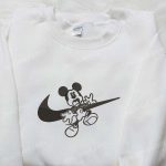 Mickey Mouse x Swoosh Embroidered Shirt: Spooky Halloween & Disney Characters – Perfect Family Gift Mickey Mouse x Swoosh Embroidered Shirt: Spooky Halloween & Disney Characters – Perfect Family Gift