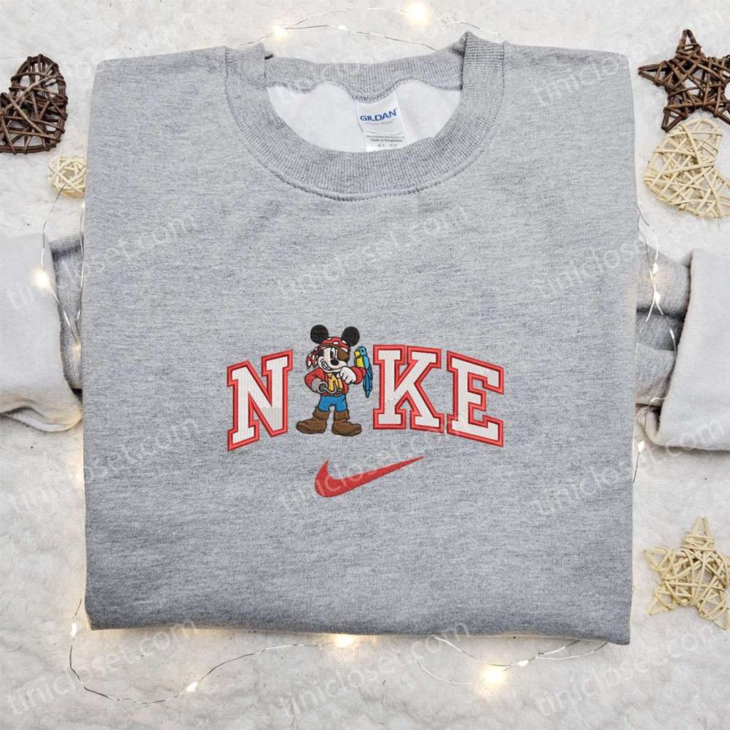 Mickey Pirate x Nike Embroidered Shirt & Disney Characters Hoodie – Cartoon Embroidery Collection for Disney Fans Mickey Pirate x Nike Embroidered Shirt & Disney Characters Hoodie – Cartoon Embroidery Collection for Disney Fans