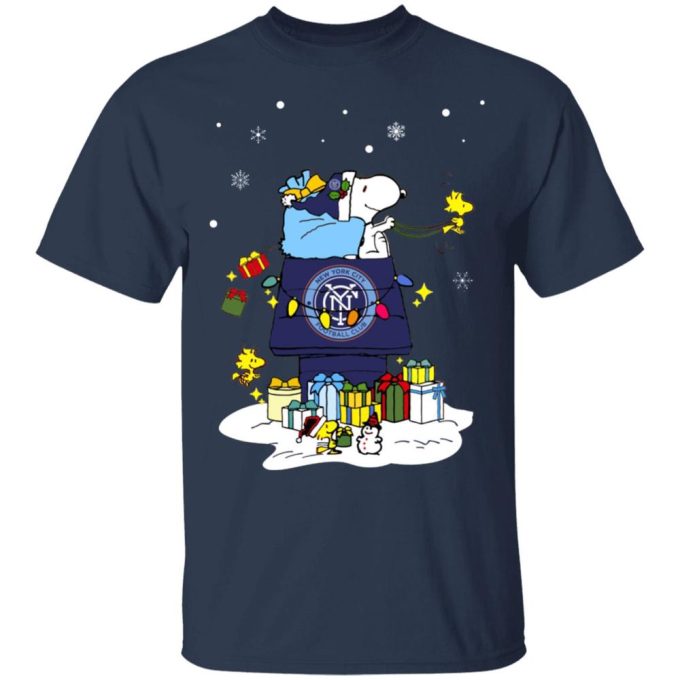 Spread Holiday Cheer with NYC FC Santa Snoopy Merry Christmas Shirt Spread Holiday Cheer with NYC FC Santa Snoopy Merry Christmas Shirt