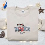 Nike Christmas x Mickey and Minnie Baby Couple Embroidered Sweatshirt: Disney Characters Movie Merry Christmas Shirt Perfect Gift! Nike Christmas x Mickey and Minnie Baby Couple Embroidered Sweatshirt: Disney Characters Movie Merry Christmas Shirt Perfect Gift!