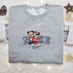 Nike Christmas x Mickey and Minnie Baby Couple Embroidered Sweatshirt: Disney Characters Movie Merry Christmas Shirt Perfect Gift! Nike Christmas x Mickey and Minnie Baby Couple Embroidered Sweatshirt: Disney Characters Movie Merry Christmas Shirt Perfect Gift!