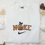 Spooktacular Nike x Disney Halloween Embroidered Shirt: Mickey Pumpkin Design & Nike Inspired Style Spooktacular Nike x Disney Halloween Embroidered Shirt: Mickey Pumpkin Design & Nike Inspired Style