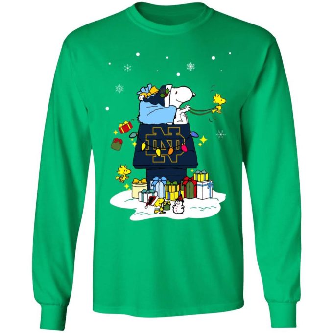 Get Festive with Notre Dame Fighting Irish Santa Snoopy Shirt – Perfect for a Merry Christmas!