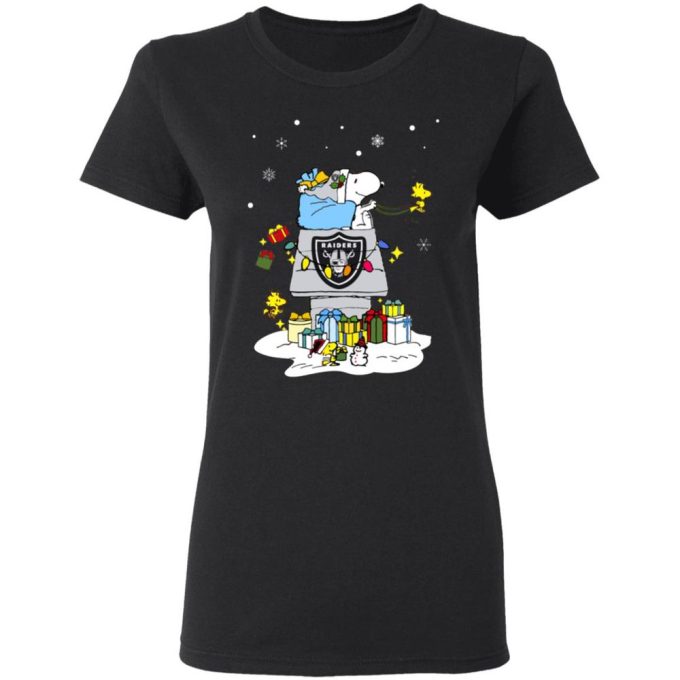 Oakland Raiders Santa Snoopy Christmas Shirt: Spread Holiday Cheer with this Festive NFL Apparel Oakland Raiders Santa Snoopy Christmas Shirt: Spread Holiday Cheer with this Festive NFL Apparel