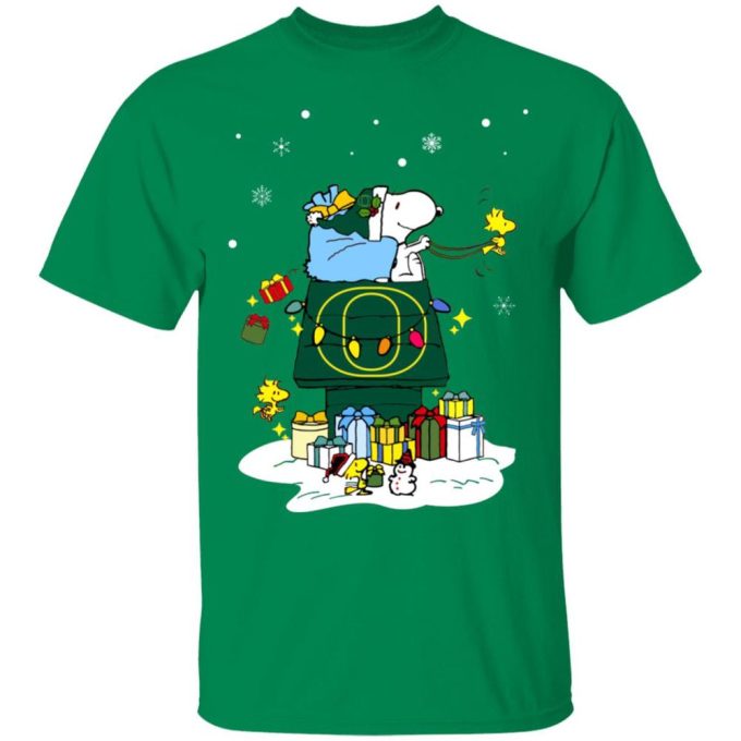 Get into the Holiday Spirit with Oregon Ducks Santa Snoopy Merry Christmas Shirt
