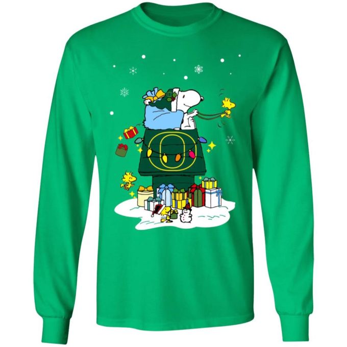 Get into the Holiday Spirit with Oregon Ducks Santa Snoopy Merry Christmas Shirt